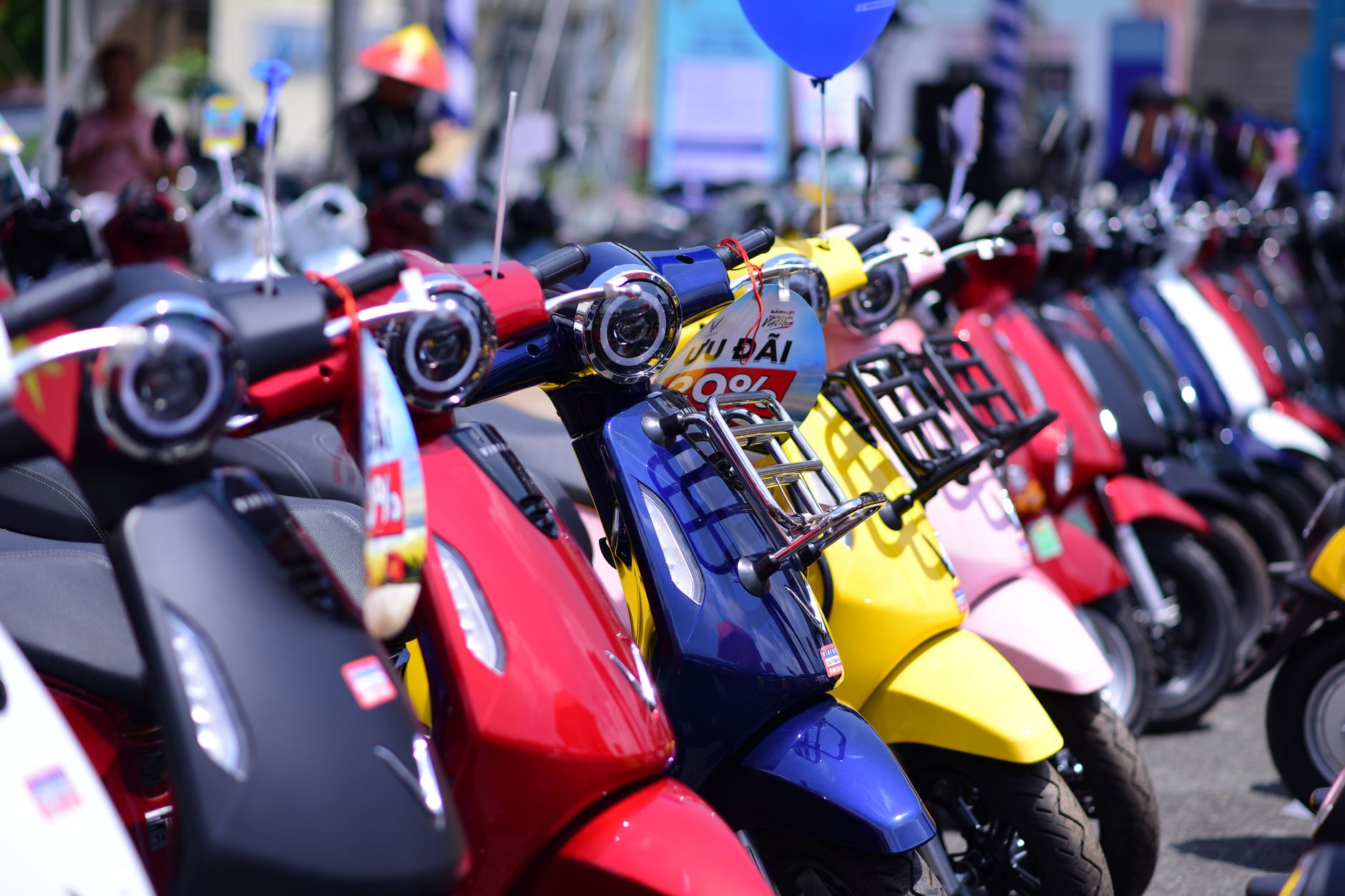 colorful row of scooters in urban market display